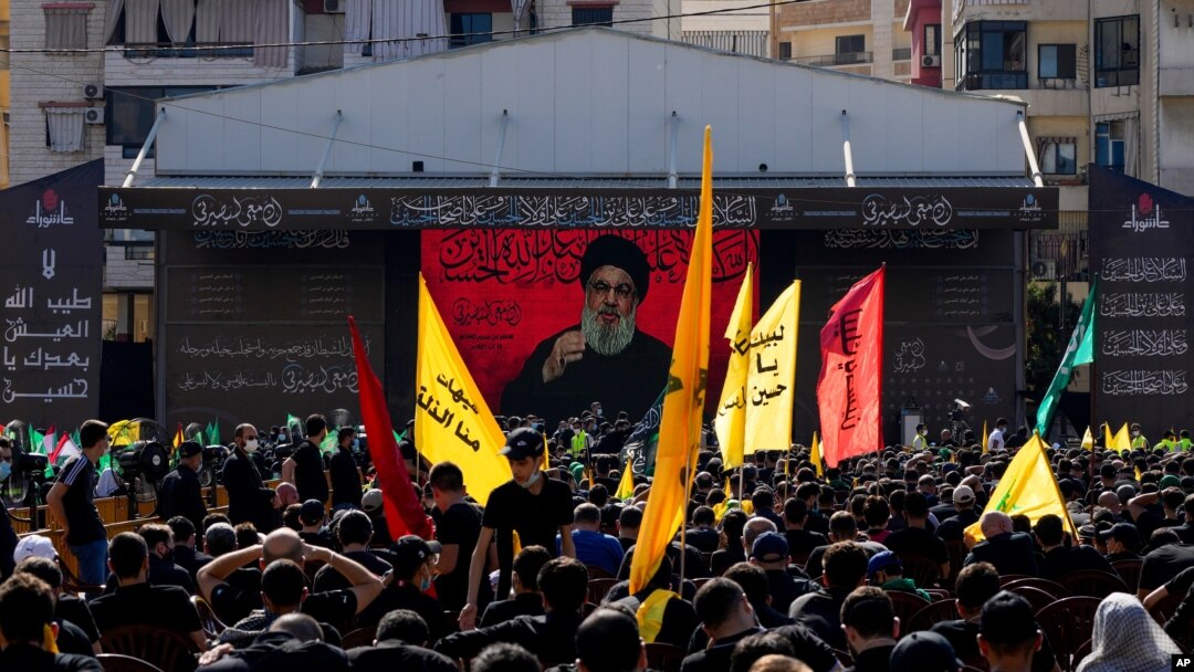 Hezbollah supporters listen to their leader Sayyed Hassan Nasrallah as he speaks via a video link during Ashoura, the Shiite Muslim commemoration marking the death of Immam Hussein, the grandson of the Prophet Muhammad, at the Battle of Karbala in…