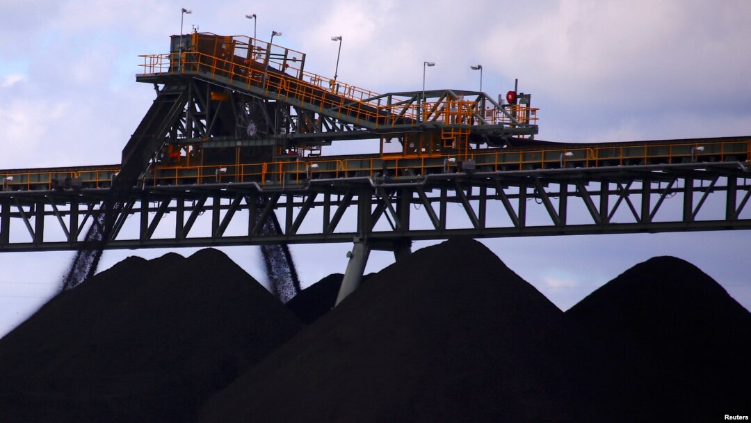 Coal is unloaded onto large piles at the Ulan Coal mines near the central New South Wales town of Mudgee in Australia, March 8, 2018. 