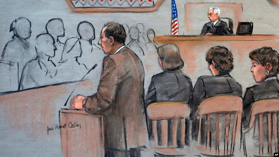 It this courtroom sketch, U.S. Attorney William Weinreb, left, is depicted delivering opening statements in front of U.S. District Judge George O'Toole Jr., right rear, on the first day of the federal death penalty trial of Boston Marathon bombing suspect Dzhokhar Tsarnaev, March 4, 2015, in Boston.