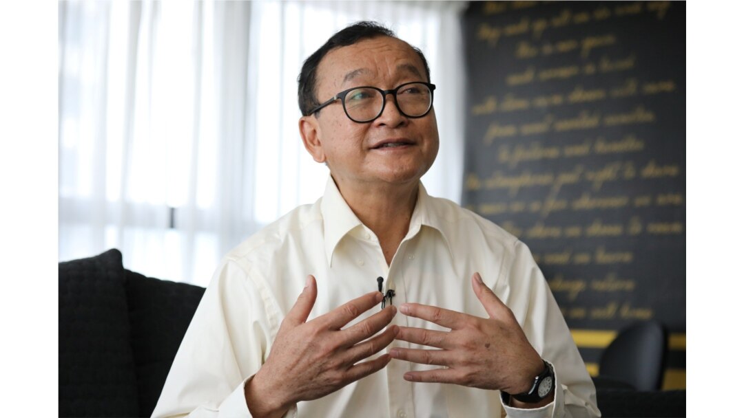 FILE - Self-exiled Cambodian opposition party founder Sam Rainsy speaks during an interview with Reuters at a hotel in Kuala Lumpur, Malaysia, Nov. 10, 2019. REUTERS/Lim Huey Teng