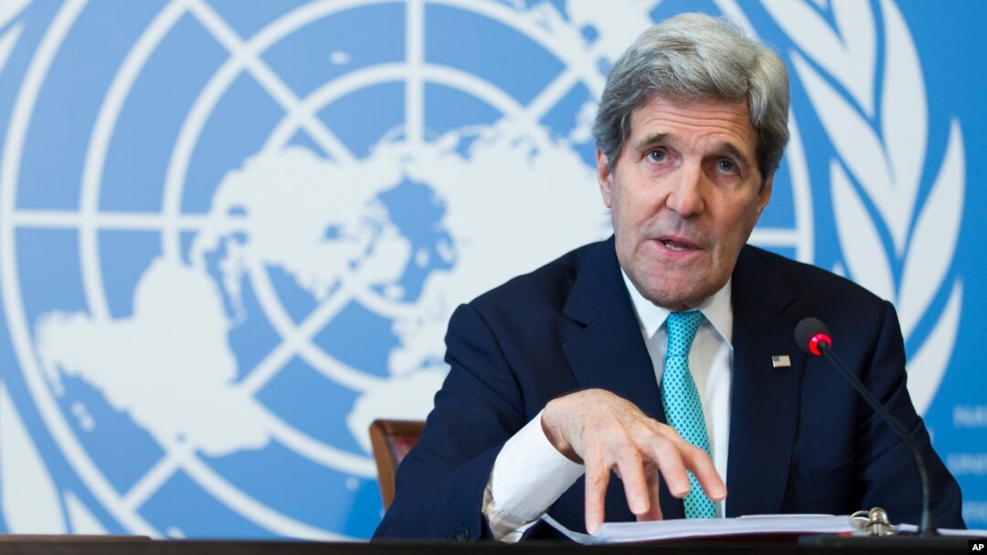 Secretary of State John Kerry gestures during a news conference after he delivered remarks to the United Nations Human Rights Council in Geneva, March 2, 2015.