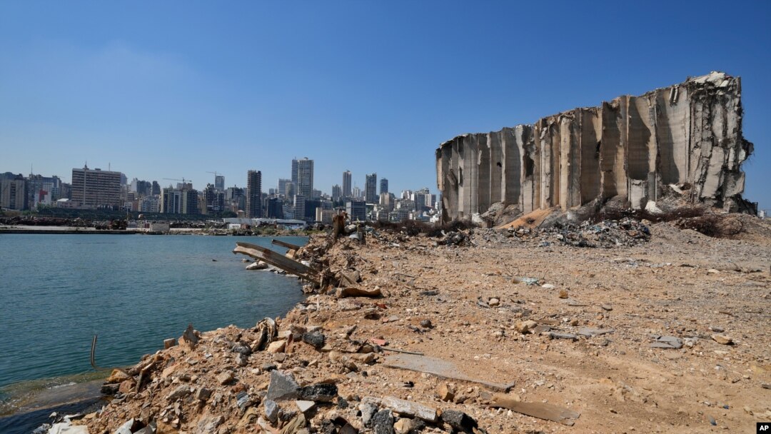 Rubble and debris remain around towering grain silos gutted in the site of a massive deadly explosion in August last year, at the port in Beirut, Lebanon, July 13, 2021. 