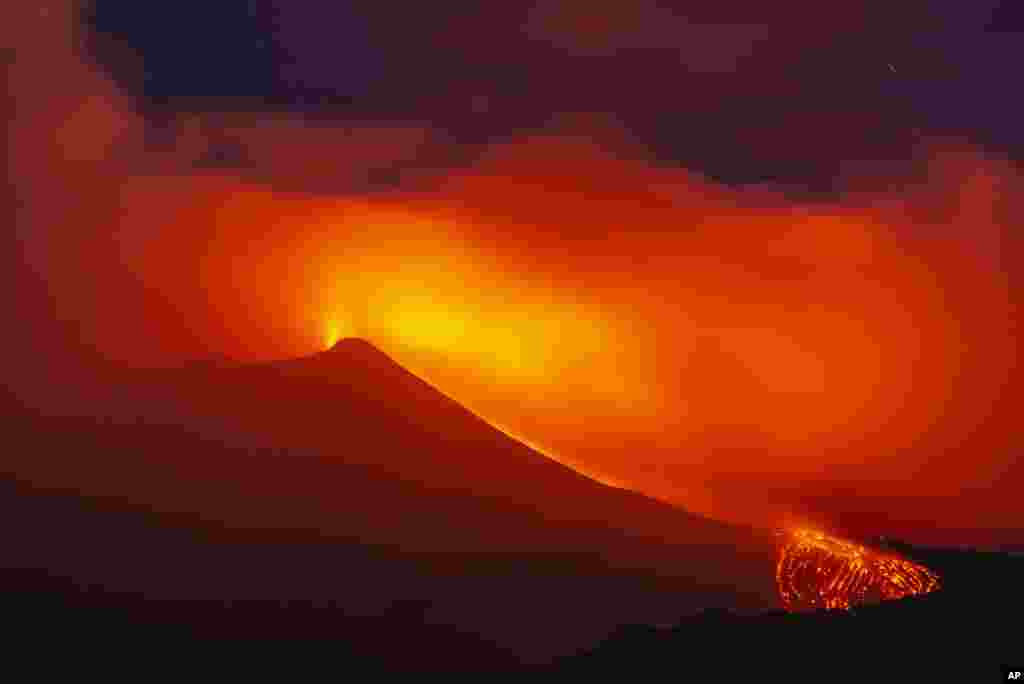 Mount Etna volcano spews lava during an eruption in Sicily, Italy, Aug. 25, 2018.