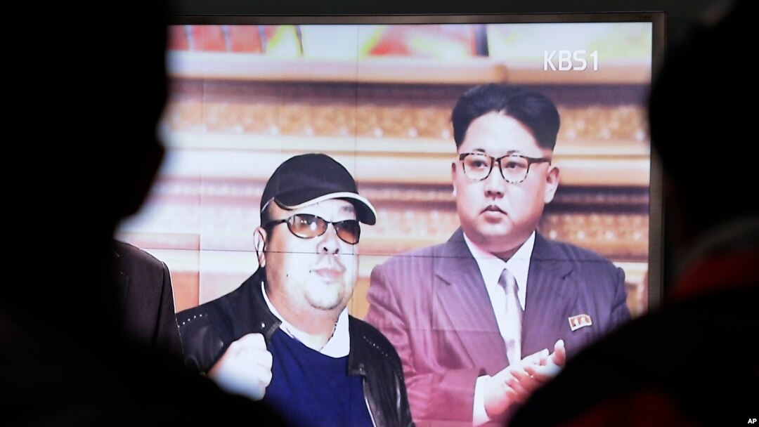 A TV screen shows pictures of North Korean leader Kim Jong Un and his older brother Kim Jong Nam, left, at the Seoul Railway Station in Seoul, South Korea, Feb. 14, 2017