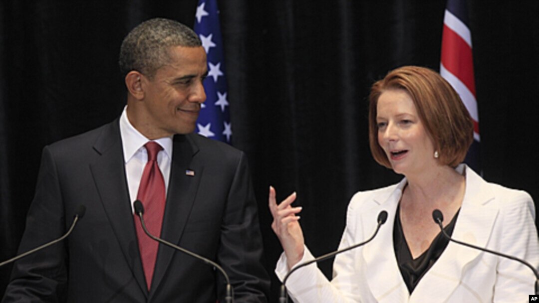 US President Barack Obama listens to Australian Prime Minister Julia Gillard during a joint press conference in Canberra, Australia, November 16, 2011.