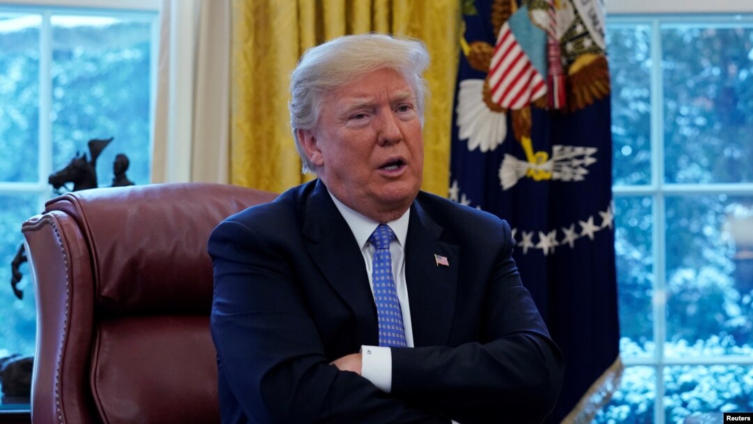 FILE - President Donald Trump speaks during an interview with Reuters at the White House in Washington, Jan. 17, 2018. 