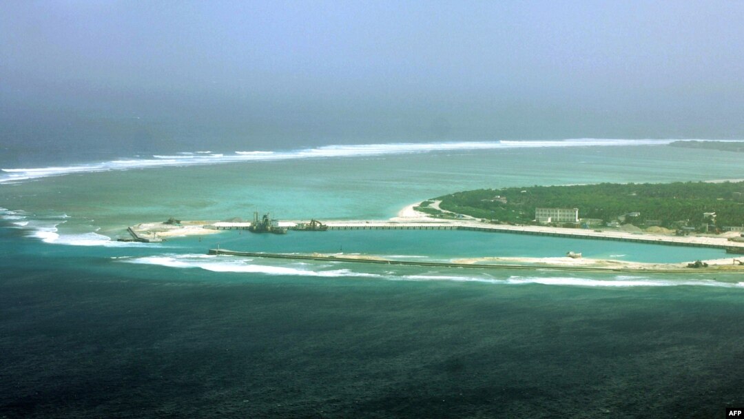 FILE - This file aerial view taken on July 27, 2012, shows part of the city of Sansha on the island of Yongxing, also known as Woody island in the disputed Paracel chain, which China now considers part of Hainan province. 