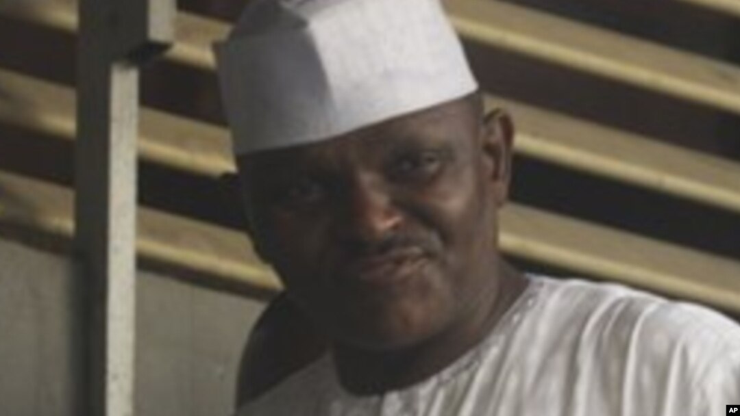 Maj. Hamza Al-Mustapha leaves the court after a verdict in Lagos, Nigeria, on Monday, Jan. 30, 2012.