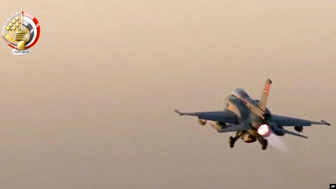 In this still image taken from video provided by the Egyptian military, an Egyptian fighter jet takes off from an undisclosed location in Egypt to strike militant hideouts in the Libyan city of Darna, May 26, 2017.
