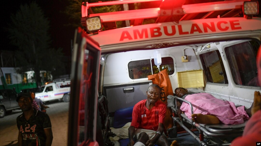 Injured people sit in the ambulance that transferred them from another town to the Immaculee Conception hospital in Les Cayes, Haiti, Aug. 17, 2021, three days after an earthquake struck the southwestern part of the nation.