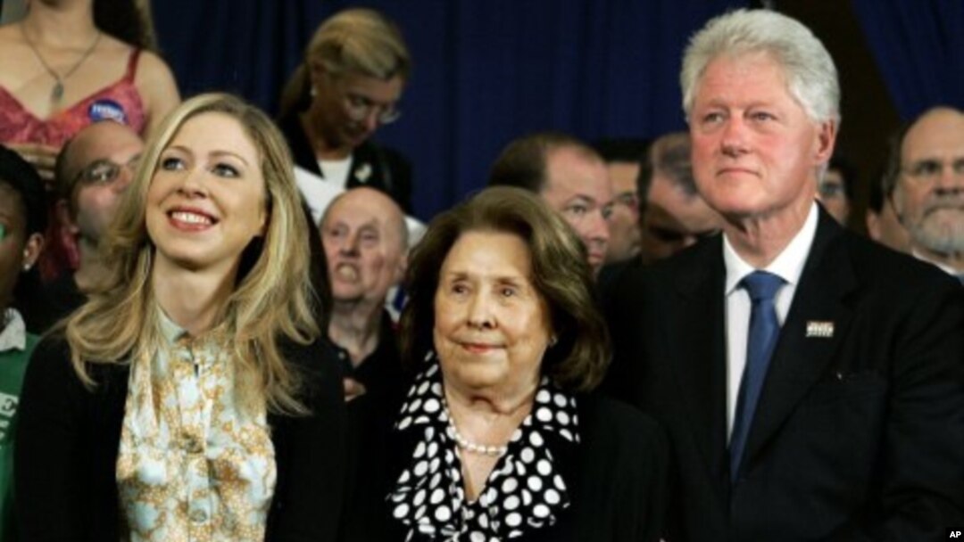 Former President Bill Clinton and his daughter, Chelsea, flank Dorothy Rodham, mother of then-Democratic presidential hopeful Sen. Hillary Rodham Clinton, D-N.Y., as she speaks at her Pennsylvania primary election night party, April 22, 2008. (file photo)