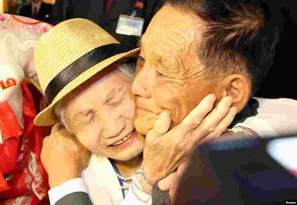 North and South Korean family members meet during a reunion at North Korea's Mount Kumgang resort, near the demilitarized zone (DMZ) separating the two Koreas, North Korea.