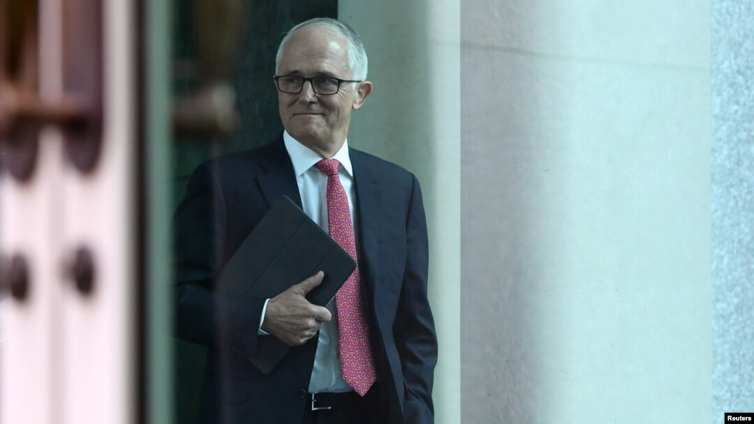 Australian Prime Minister Malcolm Turnbull arrives for a party room meeting at Parliament House in Canberra, Australia, Aug. 21, 2018. 