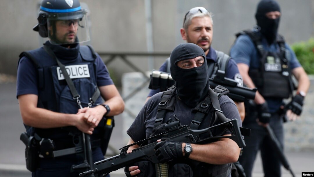 French police and anti-crime brigade (BAC) members secure a street as they carried out a counter-terrorism swoop at different locations in Argenteuil, a suburb north of Paris, France, July 21, 2016. 