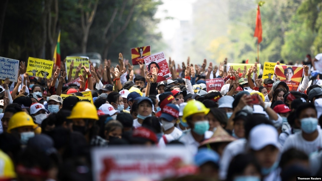 Demonstrators protest against military coup in Yangon, Feb. 22, 2021.