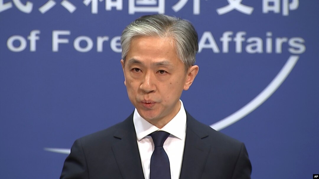 Chinese foreign ministry spokesman Wang Wenbin speaks during a routine press conference at which he congratulated US President-elect Joe Biden at the foreign ministry in Beijing on Nov. 13, 2020. 