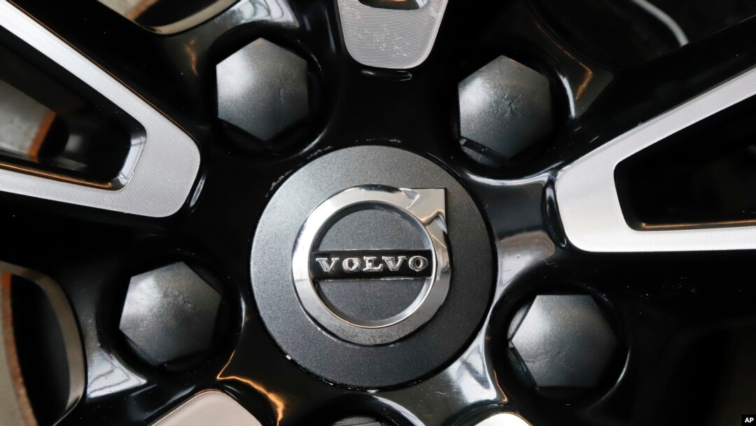 FILE - This is the Volvo logo on a wheel on a 2019 S90 T6 AWD Inscription automobile on display at the 2019 Pittsburgh International Auto Show in Pittsburgh, Feb. 14, 2019