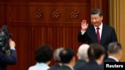 9月30日，在北京人民大会堂举行国庆招待会的习近平。