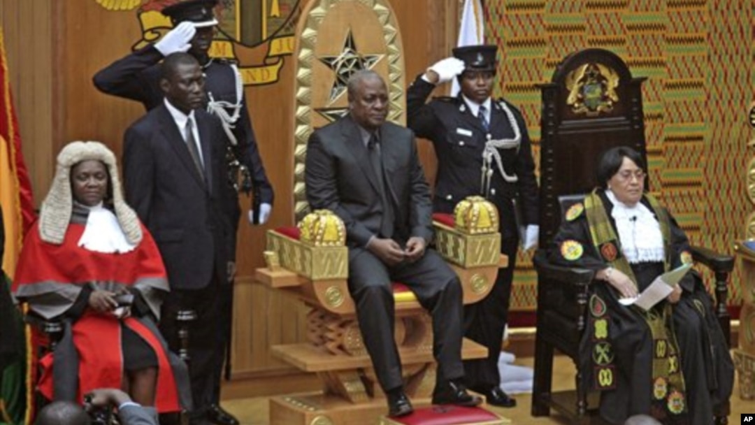 Former Ghanaian Vice President John Mahama is seated after being sworn in as President, July 24, 2012.