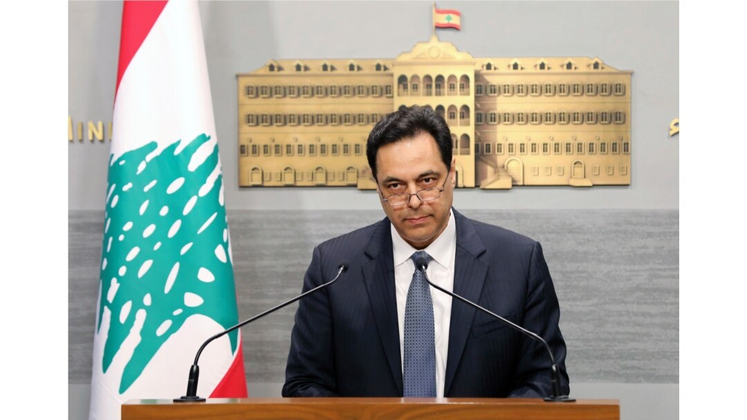 FILE - In this photo released by the Lebanese Government, Lebanese Prime Minister Hassan Diab, gives a speech at the Government House in Beirut, Lebanon, March. 7, 2020.